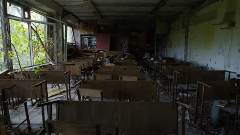 Zoom-in-view-of-abandoned-classroom-with-furniture-in-Pripyat