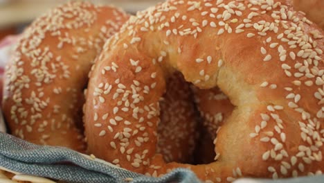 Close-Up-of-Fresh-Bagels-with-Sesame-Seeds,-Slide-Right