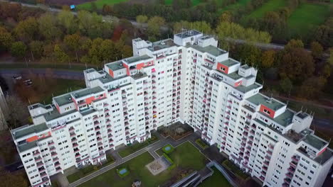 Aerial-view-of-high-rising-residential-apartment-block-complex-in-rural-suburb-of-german-city-during-daytime