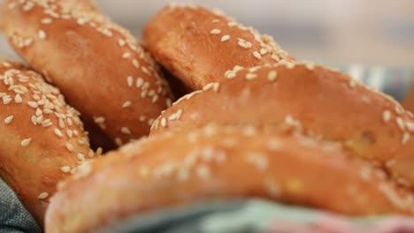 Bagels-with-Sesame-Seeds,-Close-Up-in-Slow-Motion