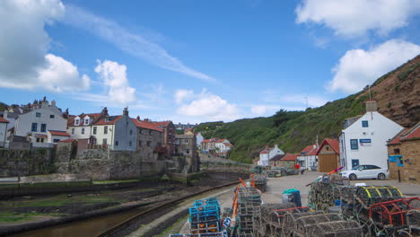 Staithes-harbourside-timelapse-in-summer-with-scudding-clouds-and-bright-sun