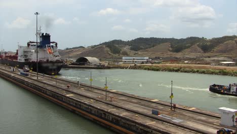 Tugboat-exiting-the-Pedro-Miguel-Locks,-Panama-Canal