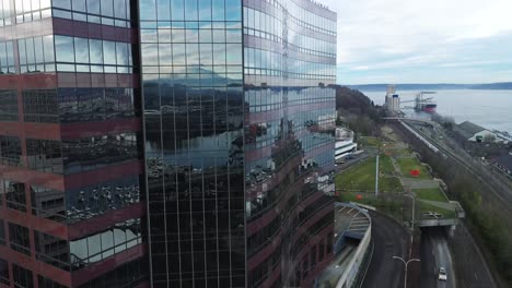 Downtown-Tacoma-Skyline-With-Mount-Rainier-Reflection-On-Glass-Exterior-In-Washington