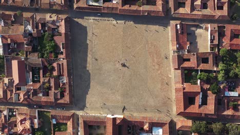 Birds-Eye-Aerial-View-of-Plaza-Mayor,-Main-Square-of-Villa-De-Leyva,-Colombia