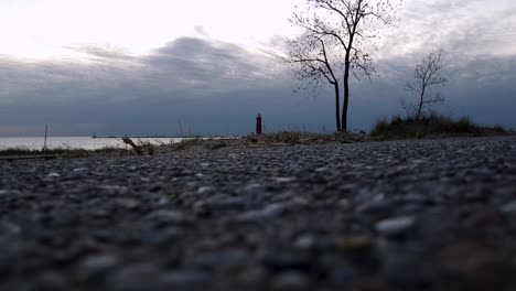 View-of-a-lighthouse-in-Muskegon-from-the-rocky-shoreline