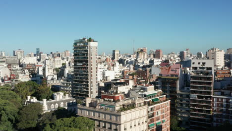 AERIAL---Recoleta-apartment-buildings,-Buenos-Aires,-Argentina,-wide-rising-shot