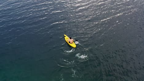 Man-Kayaking-On-The-Beautiful-San-Pablo-Island,-Hinunangan,-Southern-Leyte,-Philippines