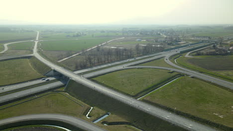 Drug-intersection-next-to-expressway,-overpass-over-highway,-Poland-s7-road