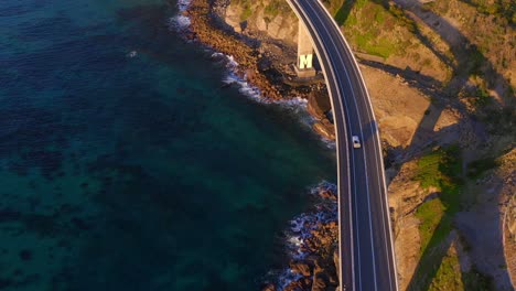 Bridge-Along-Cliff-Edge-And-Ocean-With-Cars-Driving---Sea-Cliff-Bridge-In-Illawarra-Region,-New-South-Wales,-Australia