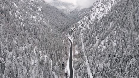 American-Fork-Canyon-in-Utah's-Wasatch-Range,-snowy-winter-aerial-view