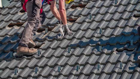 Roof-tile-hinge-installation-for-solar-at-Slovenj-Gradec