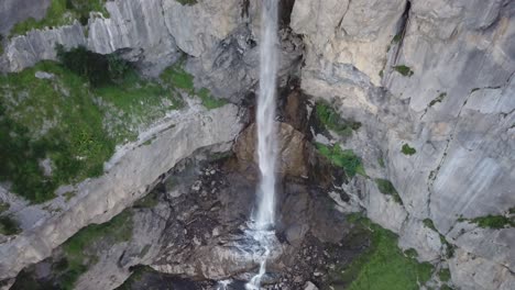 Drone-up-shot-of-waterfall-Almenbachfall-Berner-Oberland-Switzerland-drone-flight