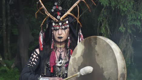 Shaman-walks-and-plays-the-drum