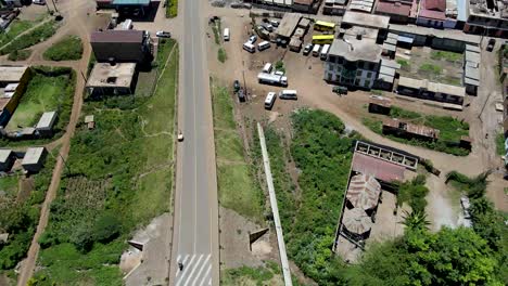 City-scape-Africa-March-2021--A-drone-flying-over-the-empty-road-in-the-village-town-of-Loitokitok-kenya