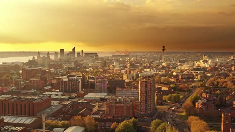 Aerial-View-Of-Liverpool-City-Skyline-And-River-Mersey-At-Sunset