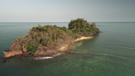 aerial-dolly-shot,-birds-eye-view-of-small-tropical-Island-in-gulf-of-Thailand