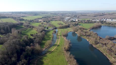 Aerial-pull-back-above-River-Stour-British-Chartham-Kent-countryside-rural-landscape
