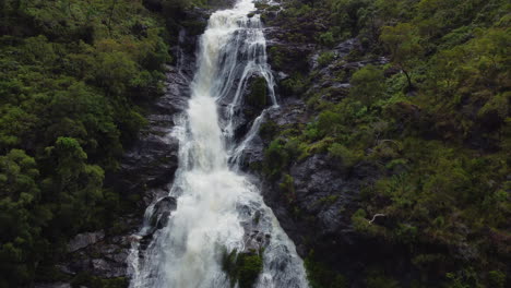 Aerial-view-approaching-huge-Colnett-waterfall-near-Hienghene,-New-Caledonia