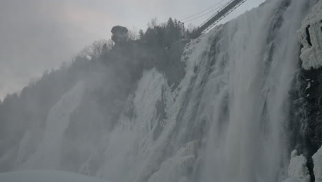 Montmorency-Waterfall-Covered-With-Ice-During-Winter-In-North-America,-Quebec-City,-Canada