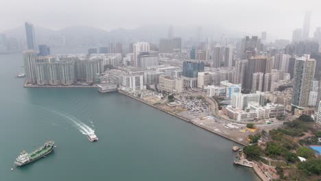 Costa-De-La-Bahía-De-Hong-Kong-Y-Rascacielos-Frente-Al-Mar,-Vista-Aérea