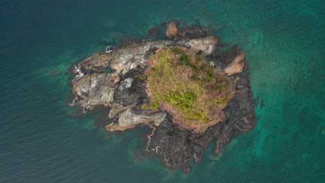 Aerial-top-down-showing-Bolog-Island-in-front-of-Nacpan-beach-Nearby-El-Nido,-Palawan,-Philippines