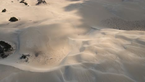 Aerial-flyover-Australian-sandy-desert-during-sunny-day-and-cloudy-day