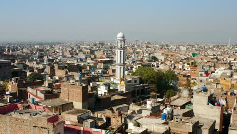 Minaret-Of-A-Mosque-With-Cityscape-At-Daytime-In-Rawalpindi,-Pakistan