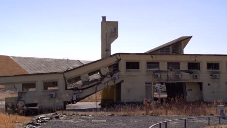 Slow-motion-pan-over-destroyed-building-after-Tohoku-Tsunami-in-Japan