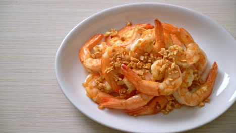 fried-shrimps-or-prawns-with-garlic-on-white-plate---seafood-style
