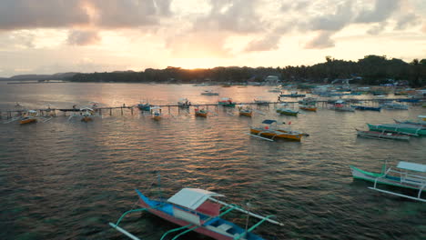 Sunset-harbour-view-of-Genereal-Luna-on-Siargao-Island,-Phillipines