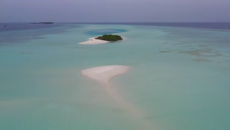 Aerial-view-of-isolated-natural-island,-Maldives