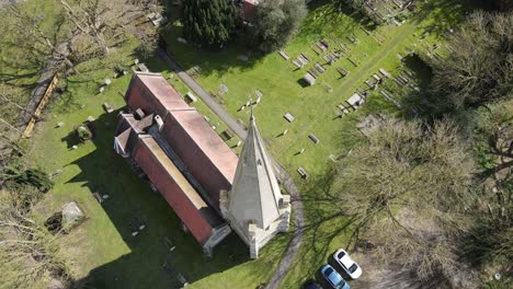 Drone-overhead-Church-Spires-Birds-eye-view-rise-to-reveal-cross-St-Mary's-Church,-Widford