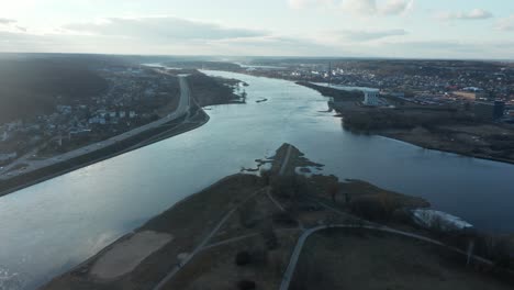 AERIAL:-Flying-Towards-Banks-of-the-Nemunas-River-with-Confluence-to-Neris-River