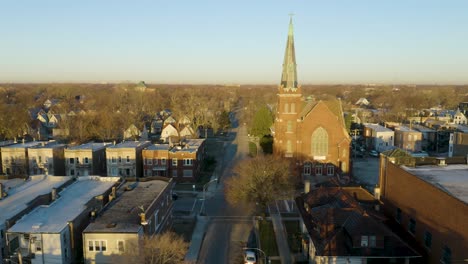 Aerial-Establishing-Shot-of-St-Stephen's-Lutheran-Church-in-Englewood,-Chicago-at-Sunrise