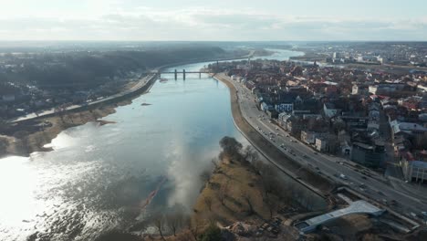 AERIAL:-Nemunas-River-with-European-Capital-of-Culture-2022-Kaunas-City-Panorama