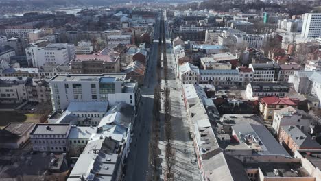 AERIAL:-Flying-Above-Laisves-Avenue-in-Kaunas-on-a-Sunny-Day