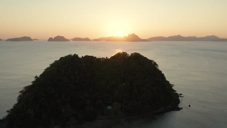 Aerial-shwoing-Depeldet-Island-with-Sunset-nearby-El-Nido-in-the-Pilippines