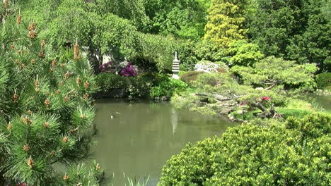 Stone-pagoda-and-pond-in-a-Japanese-garden