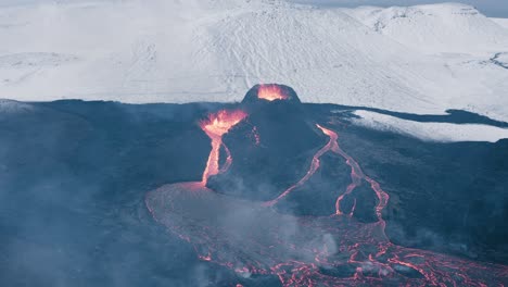 Glowing-magma-rises-from-earth-crust-out-of-Iceland-volcano,-Geldingadalsgos