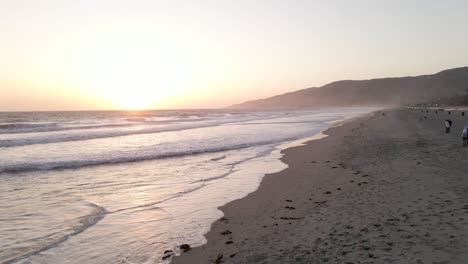 Vibrant-Sunset-at-Zuma-Beach-on-Malibu-Shore-Coastline,-California---Aerial