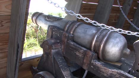 Close-up-of-an-old-cannon-on-the-deck-of-a-ship