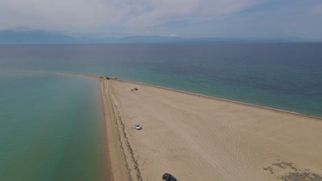 4k-steady-clip-over-a-peninsula-on-the-tropical-beach-of-Epanomi,-Halkidiki,-Greece
