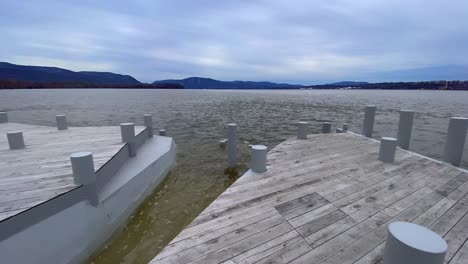 A-large-wooden-dock-patio-overlooking-the-Hudson-River-as-seen-from-Beacon,-New-York