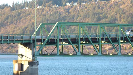 Cars-drive-through-Hood-River-Bridge-steel-truss-construction-on-Columbia-River