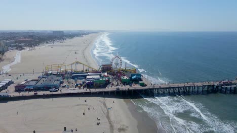 Aerial-view-around-the-Santa-Monica-Pier,-in-Los-Angeles---circling,-drone-shot
