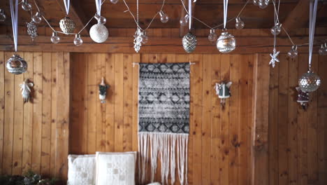 Stylish-winter-decoration-inside-wooden-cottage,-wedding-party-design