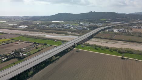 Aerial-flying-towards-Spanish-highway-over-Tordera-River