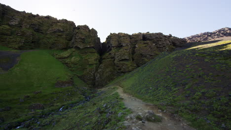 Crevasse-in-mountains-of-Snaefellsnes-Peninsula,-Iceland,-wide-shot-pan-left