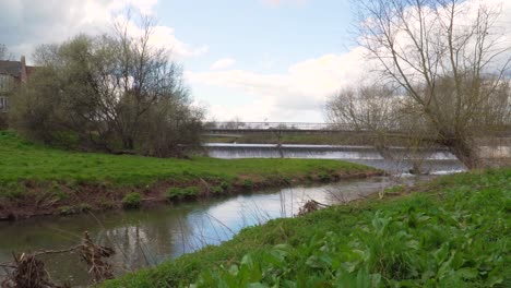 4K-river-tone-in-Taunton-Somerset,-blue-sky-background