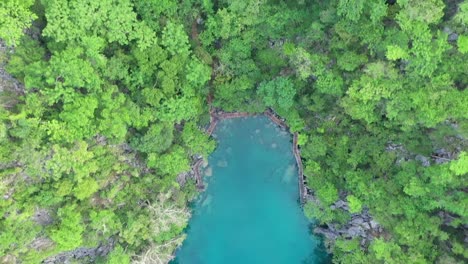 Aerial-top-down-view-of-limestone-karst-scenery-and-turquoise-water-in-Coron-Island,-Palawan,-Philippines